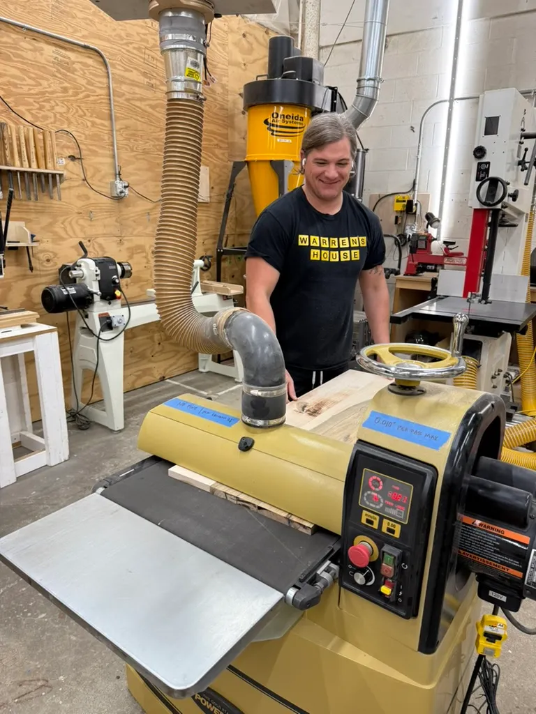 Person Standing At Powermatic Drum Sander