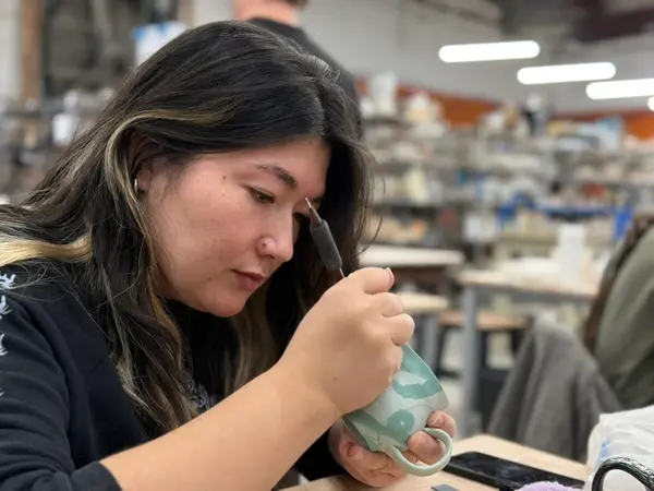 Sgraffito Carving Pottery In Studio