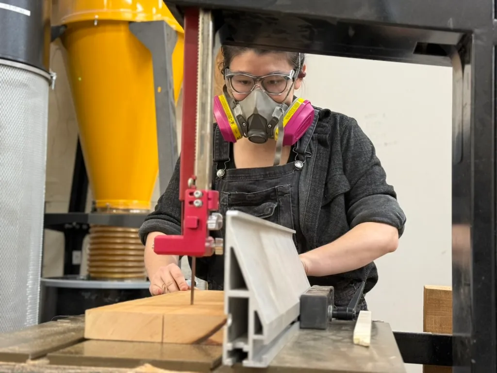 Wood Bandsaw Operator In Safety Gear